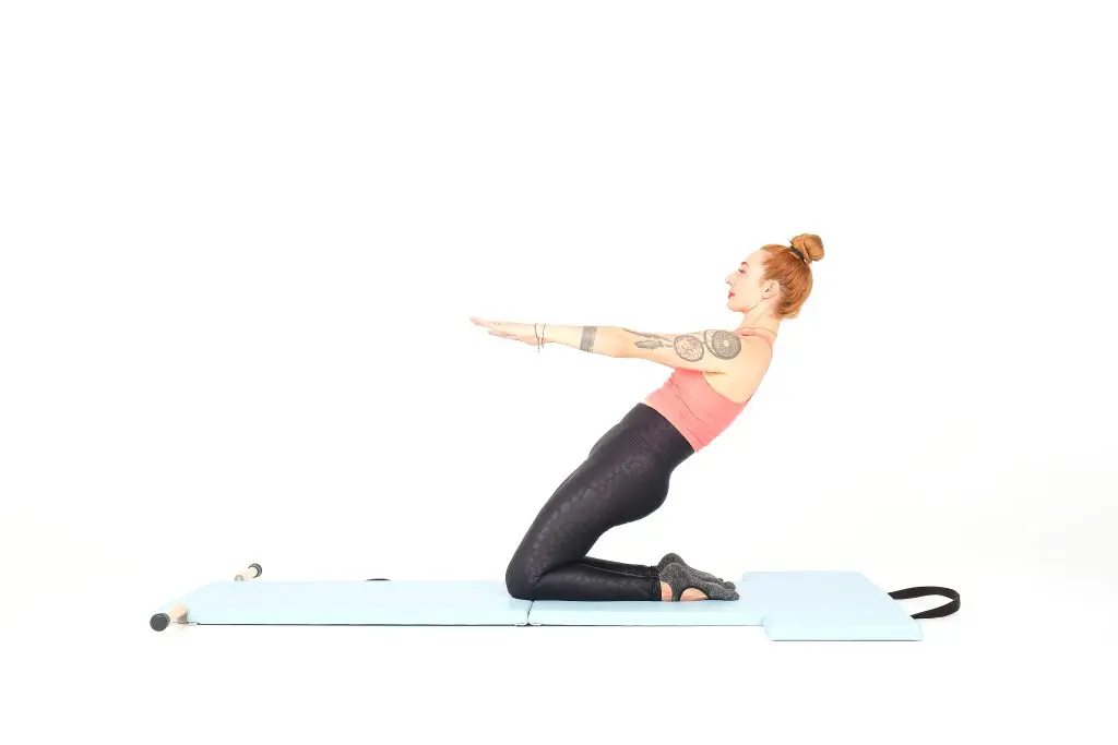 thigh stretch on the mat online pilates classes