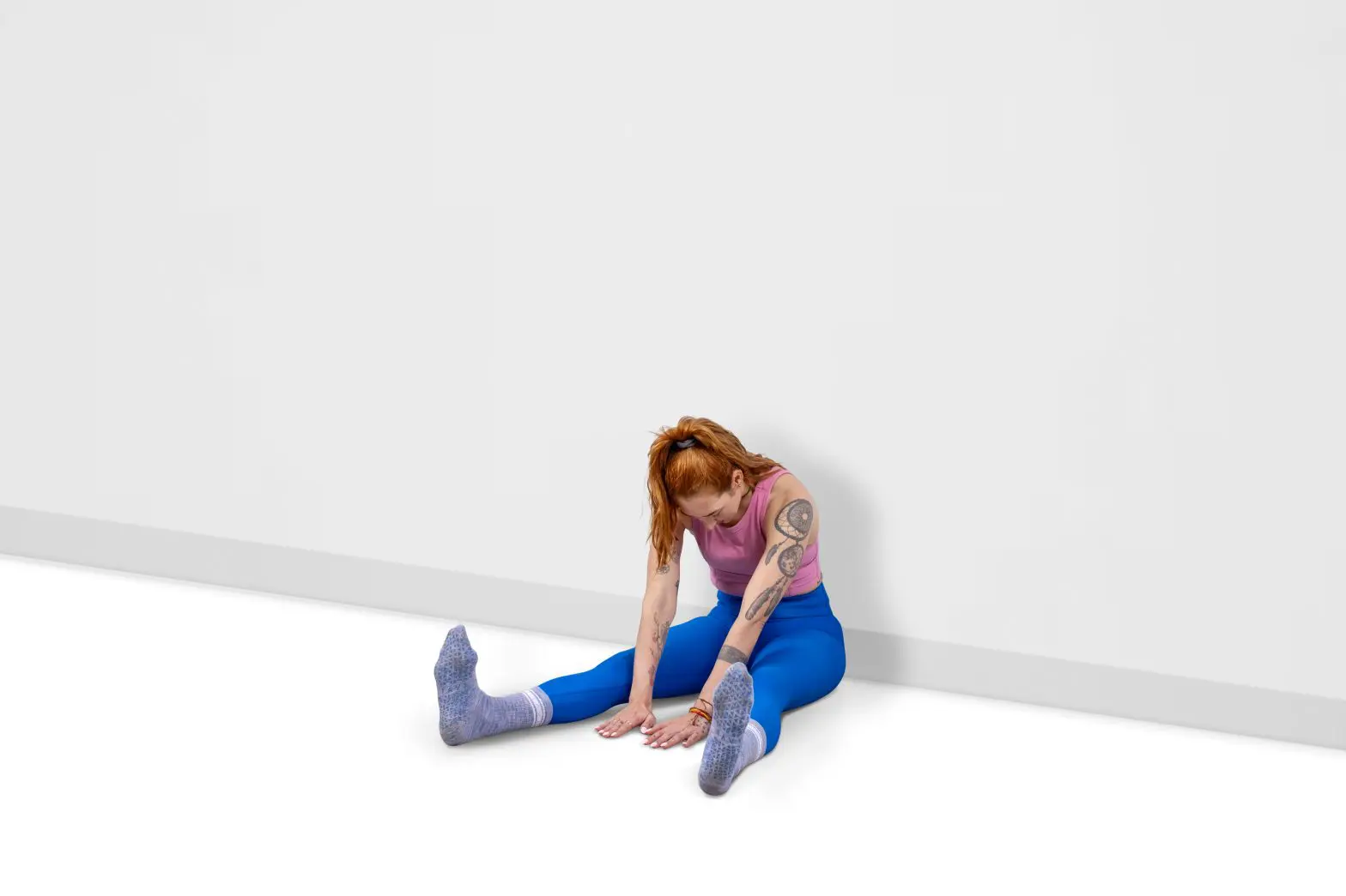 spine stretch forward with the wall online pilates classes