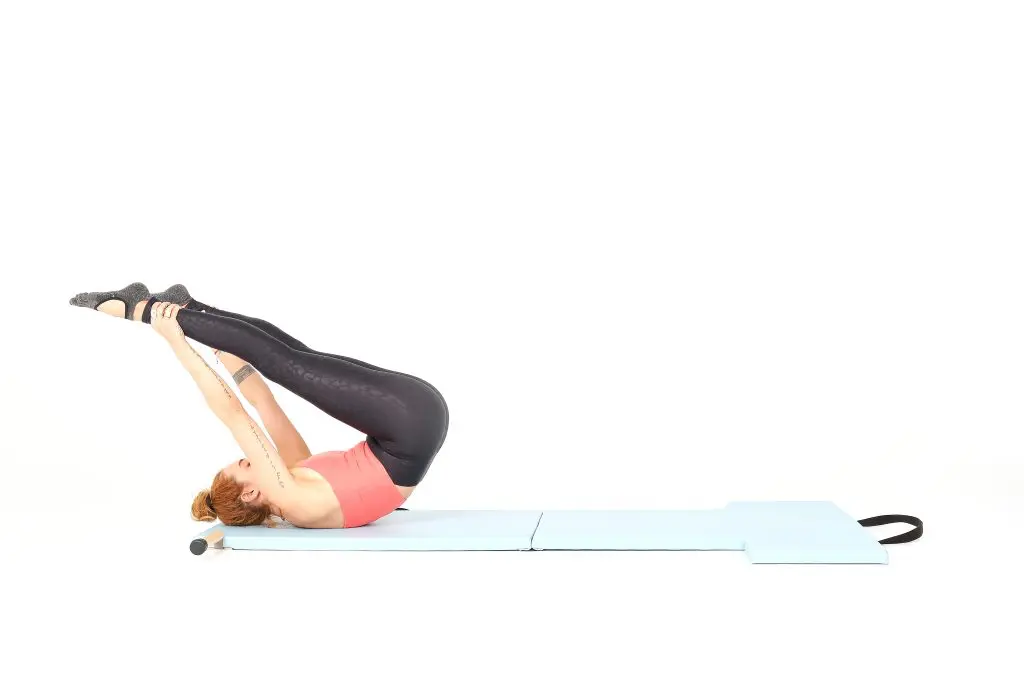 open leg rocker on the mat online pilates classes