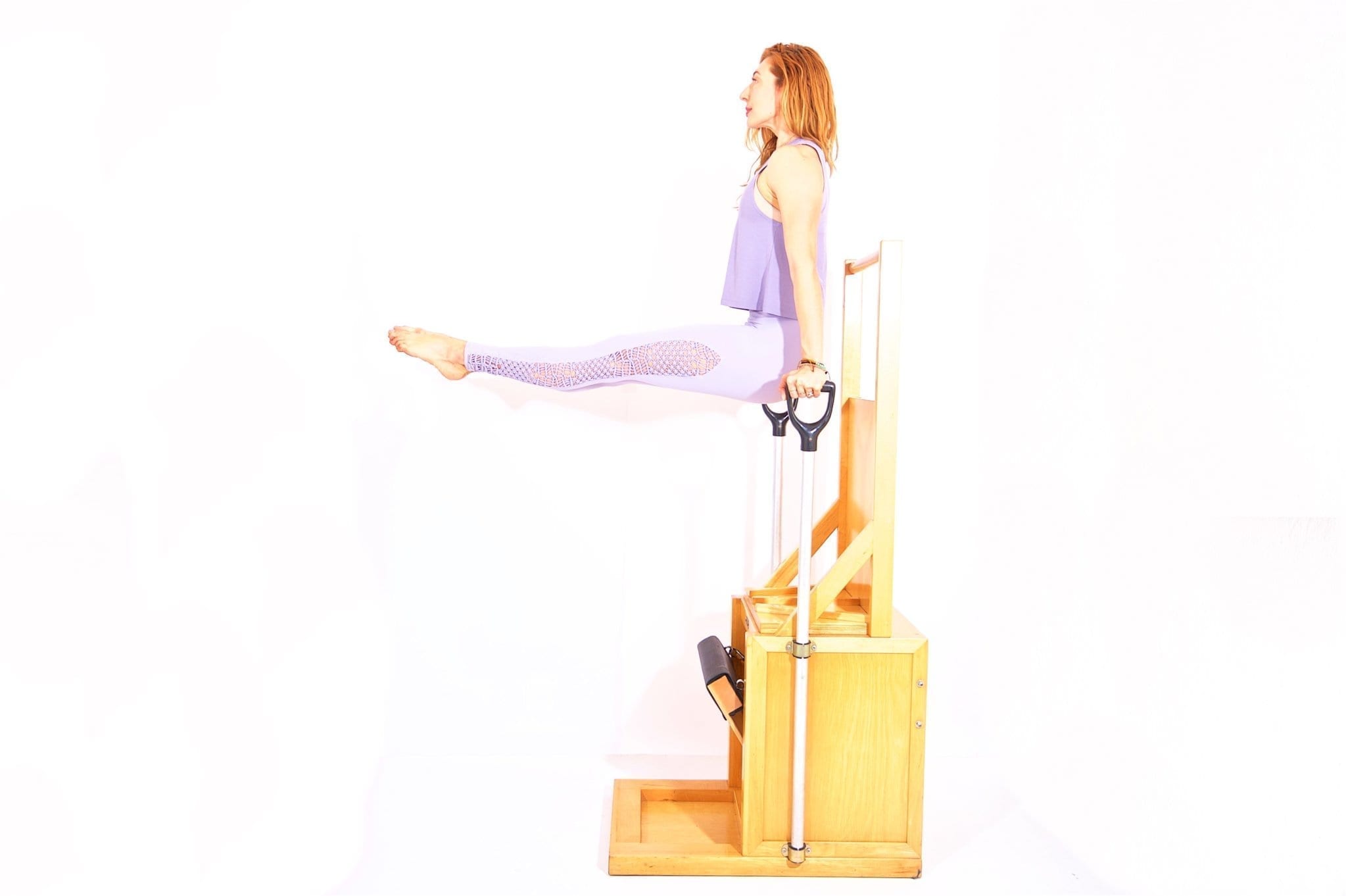 Reverse-Press-Up-on-the-High-Chair-Online-Pilates-Classes