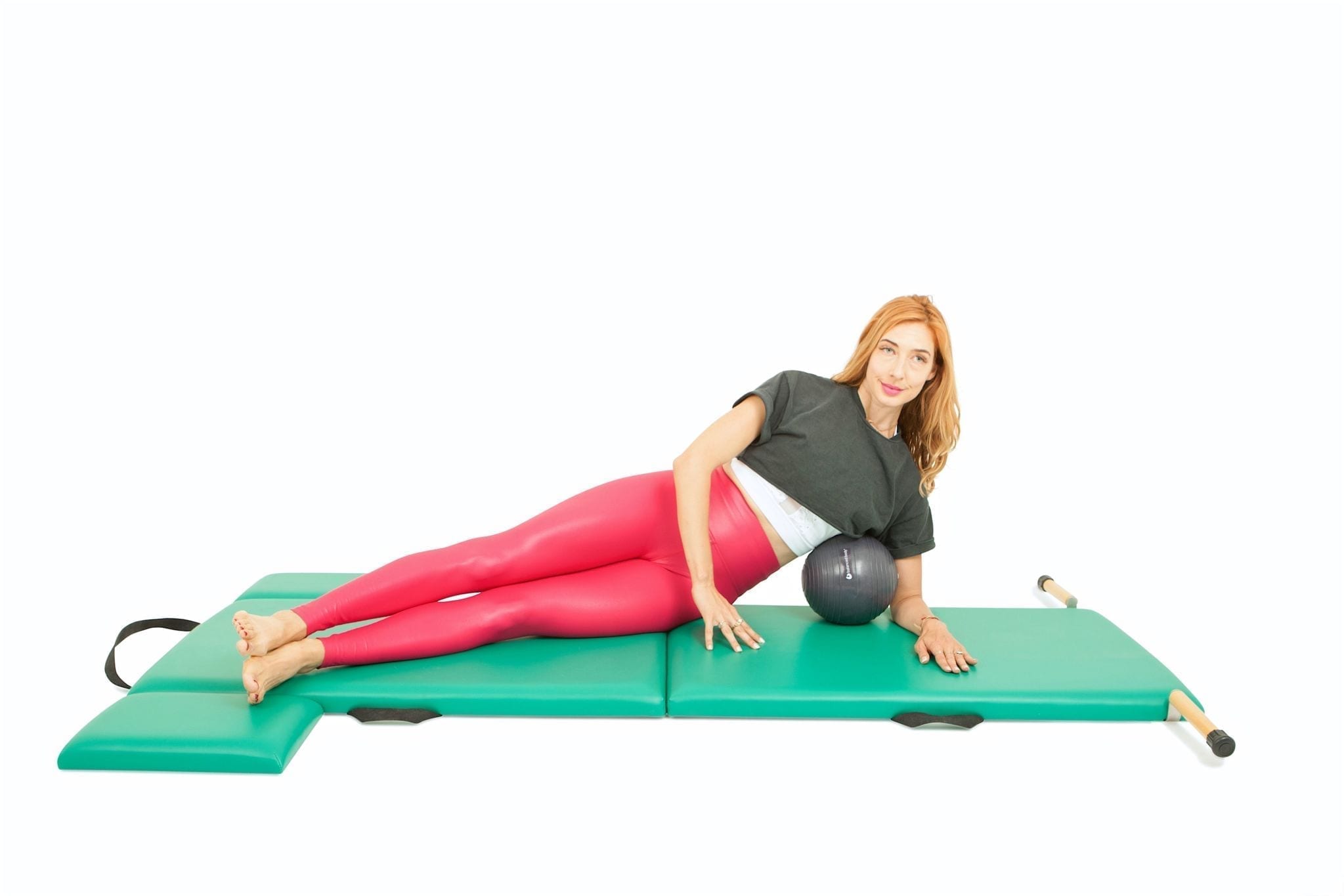Side Kicks with a Ball on the Mat - Online Pilates Classes
