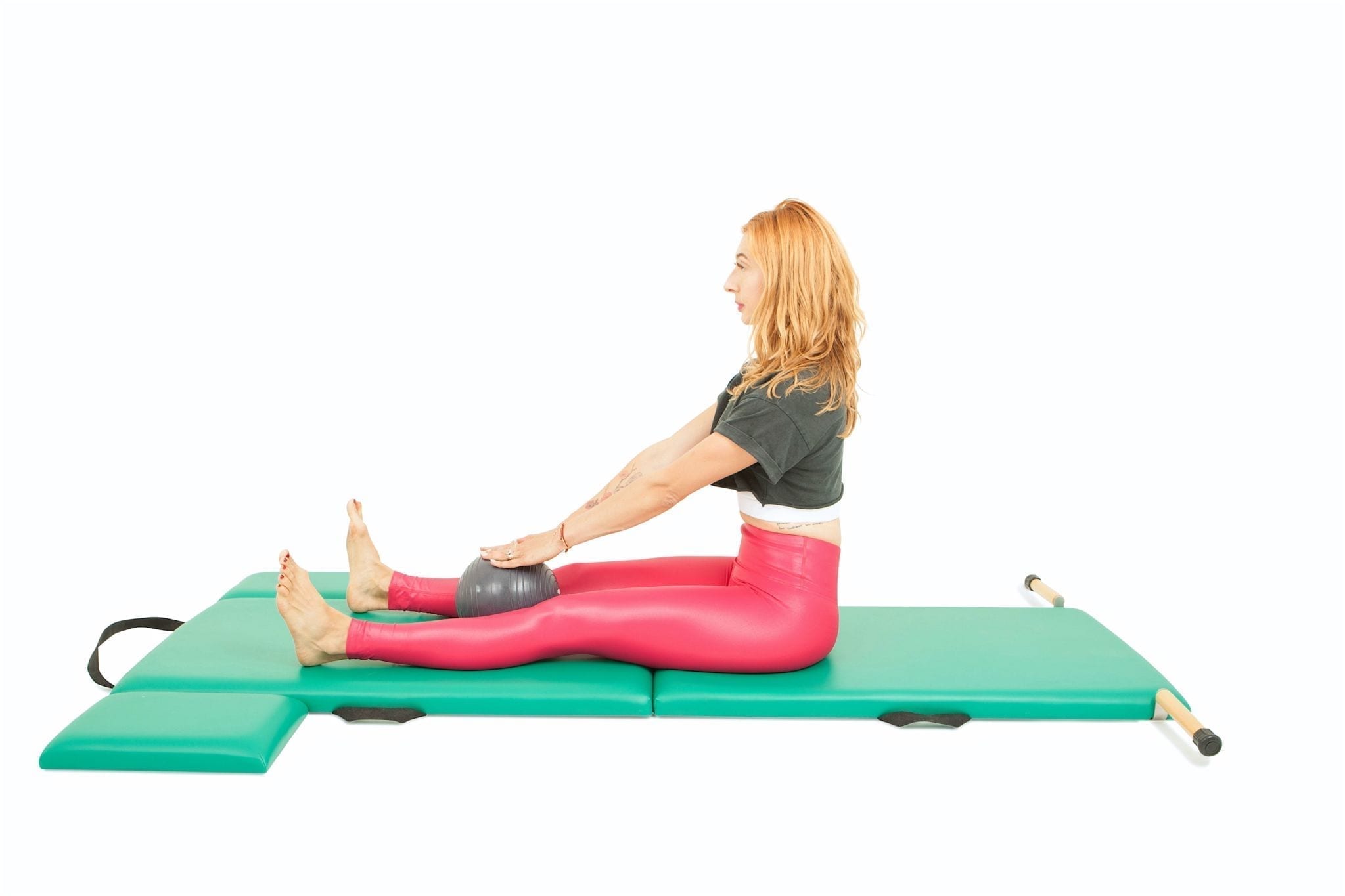 Spine Stretch Forward with a Ball on the Mat - Online Pilates Classes