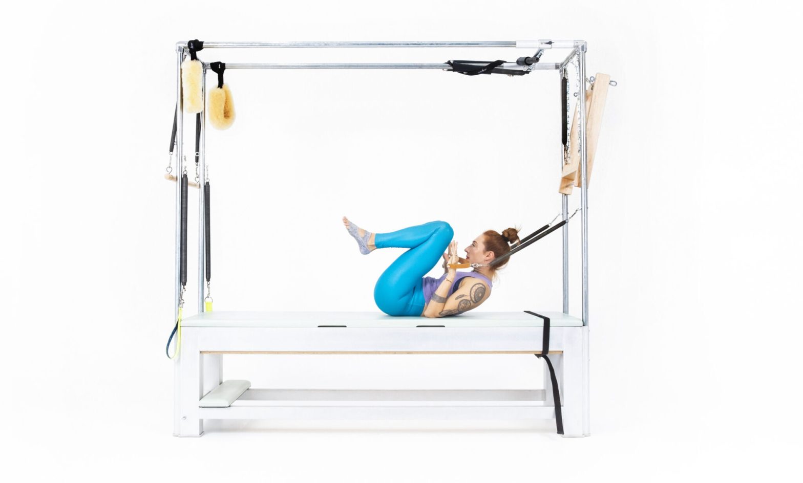 Coordination-on-the-Cadillac-Online-Pilates-Classes-scaled