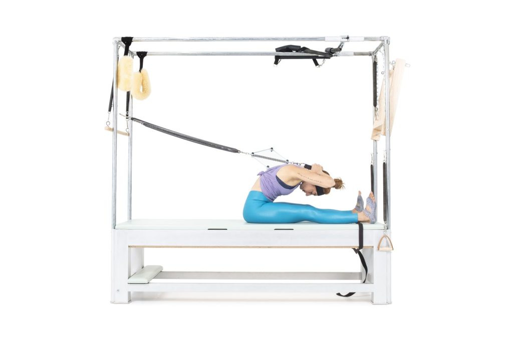 Seated Forward Bend with Neck Stretcher on the Cadillac or Tower - Online Pilates Classes
