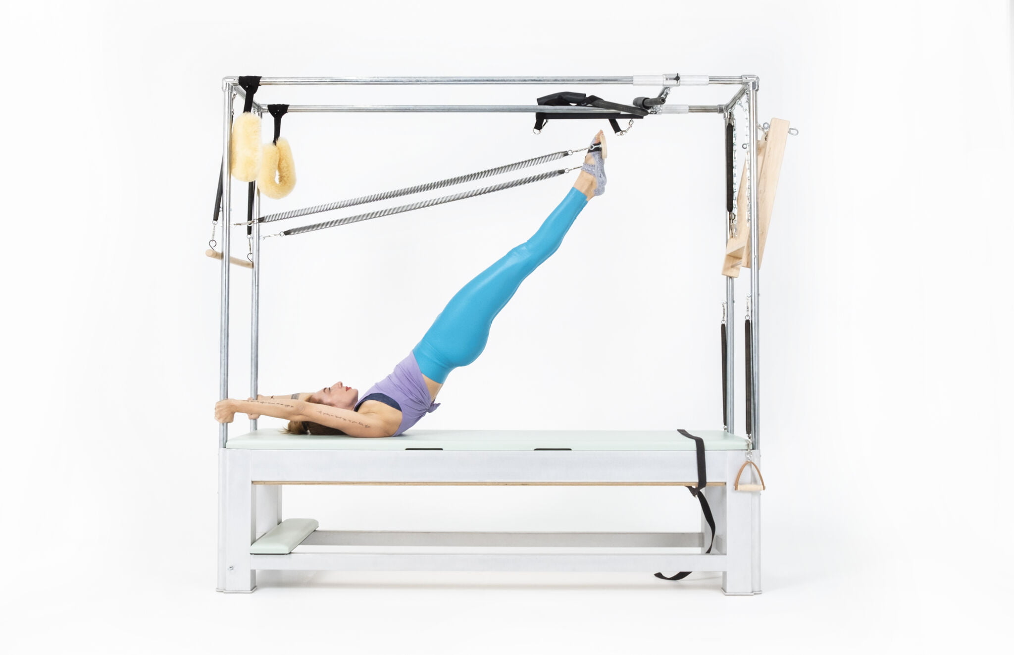 Airplane with Board with Leg Springs on the Cadillac or Tower - Online Pilates Classes
