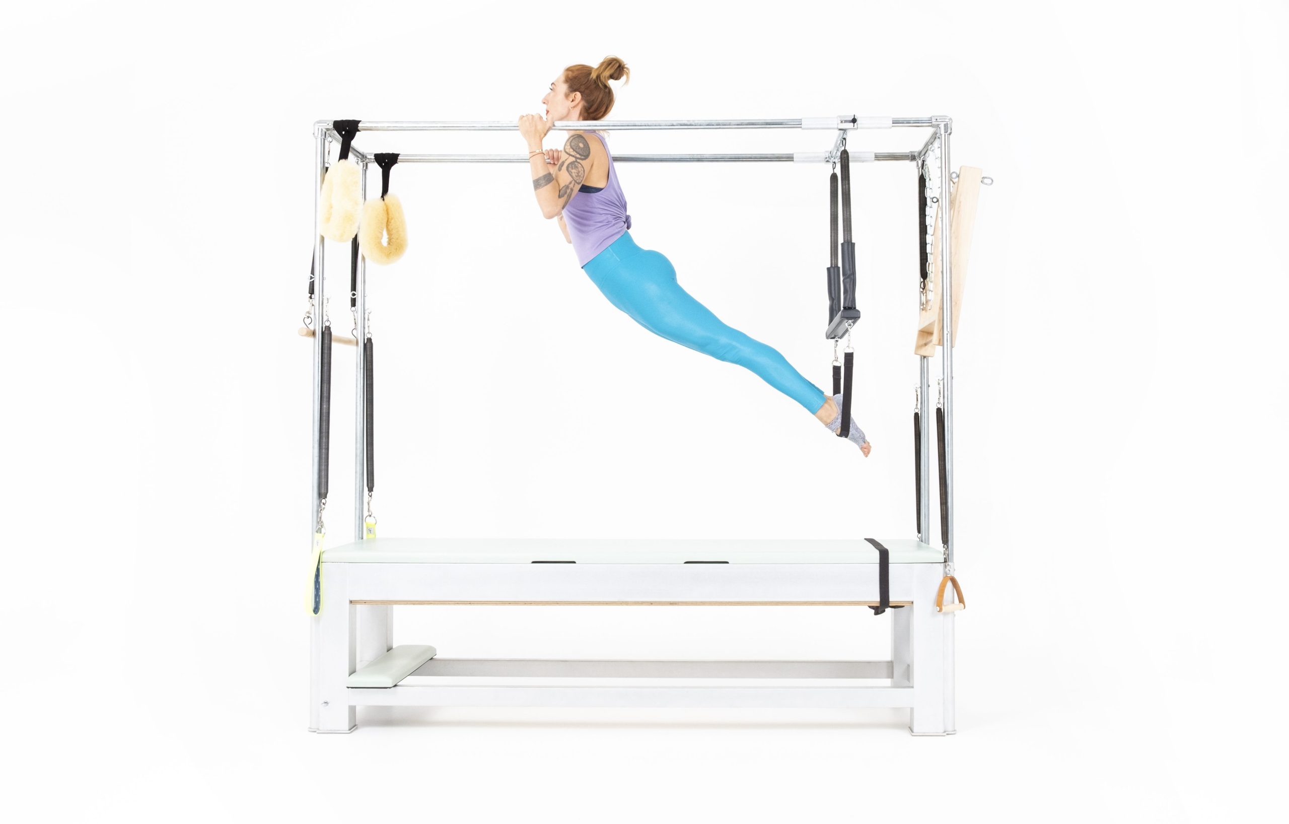 Pull-Up-with-Trapeze-on-the-Cadillac-Online-PIlates-Classes