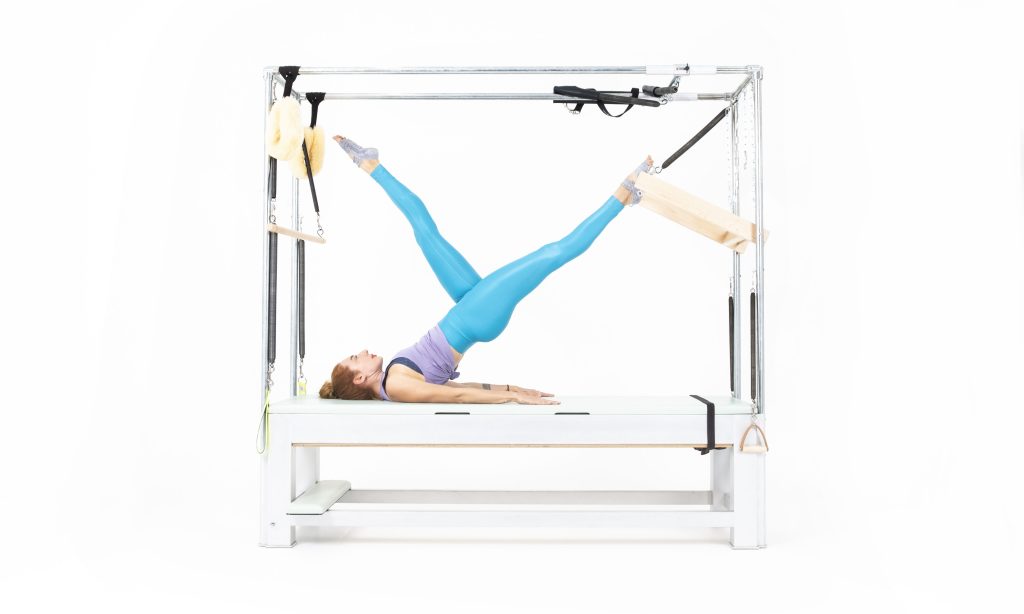 Shoulder Roll Down with Push Thru Bar on the Cadillac or Tower - Online Pilates Classes