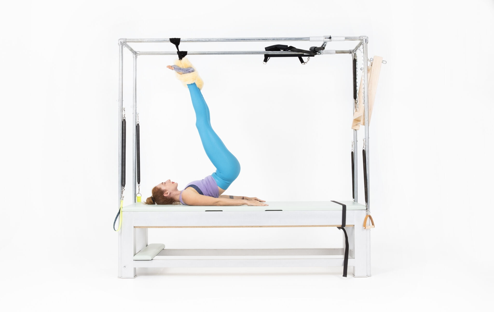 Half-Hanging-on-the-Cadillac-Online-Pilates-Classes-scaled
