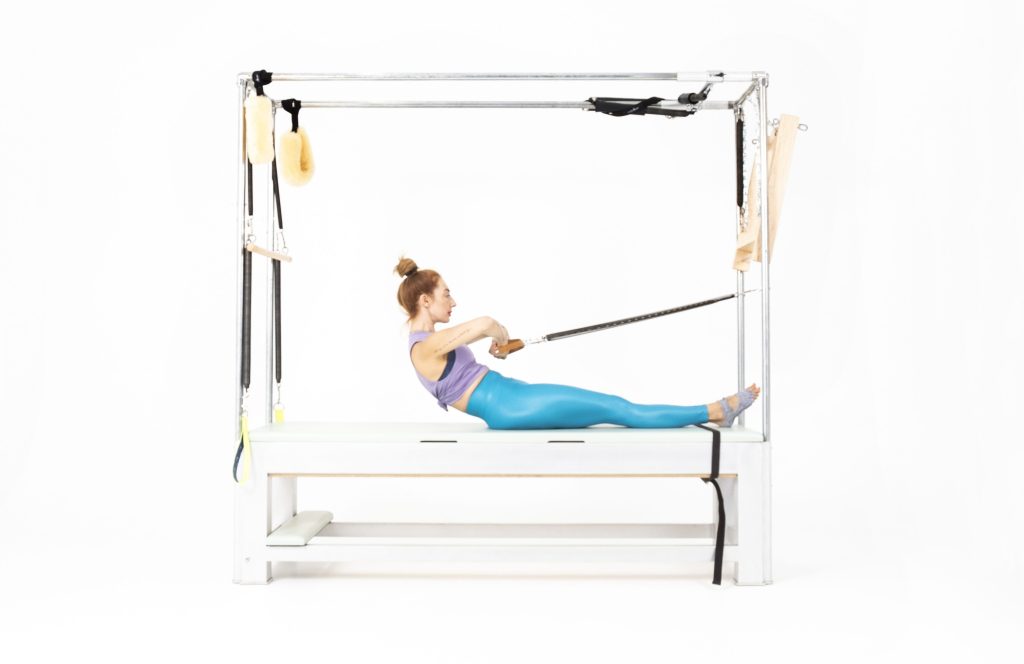 Rowing 1 Into the Sternum with Arm Springs on the Cadillac or Tower - Online Pilates Classes