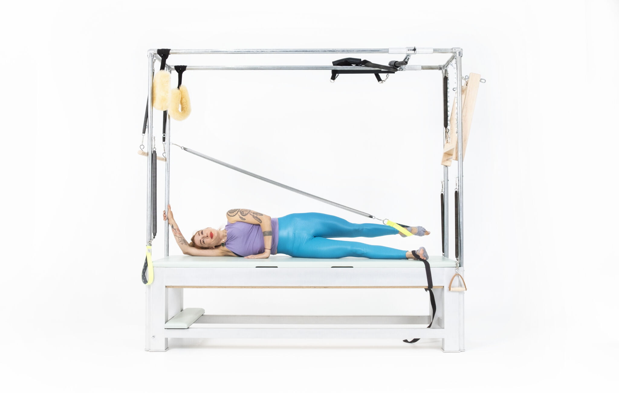 Side-Leg-Springs-Small-Circles-on-the-Cadillac-or-Tower-Online-Pilates-Classes-scaled