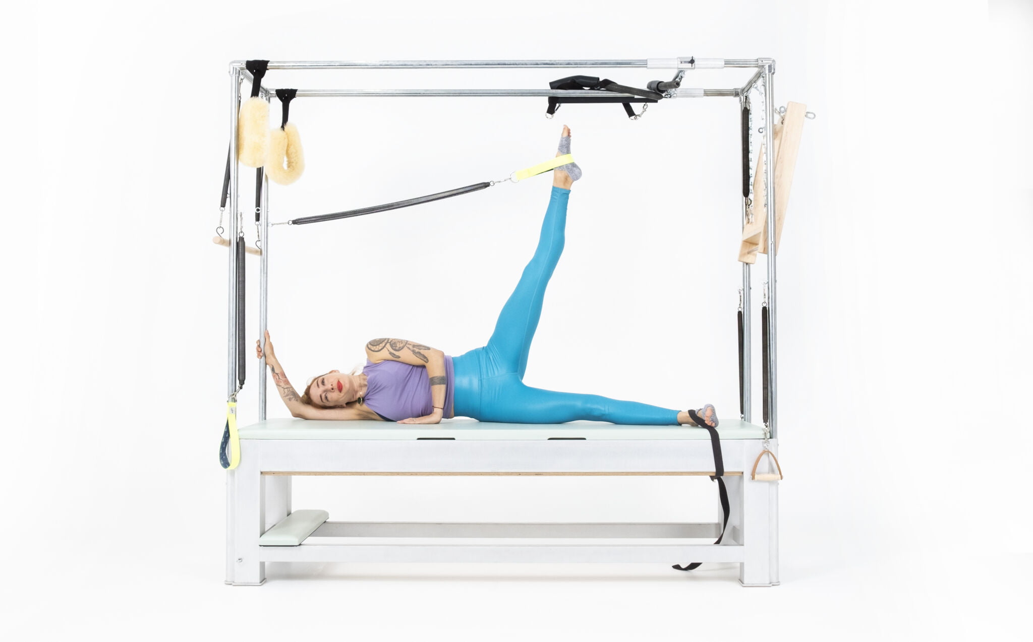 Side-Leg-Springs-Up-Down-on-the-Cadillac-or-Tower-Online-Pilates-Classes-scaled