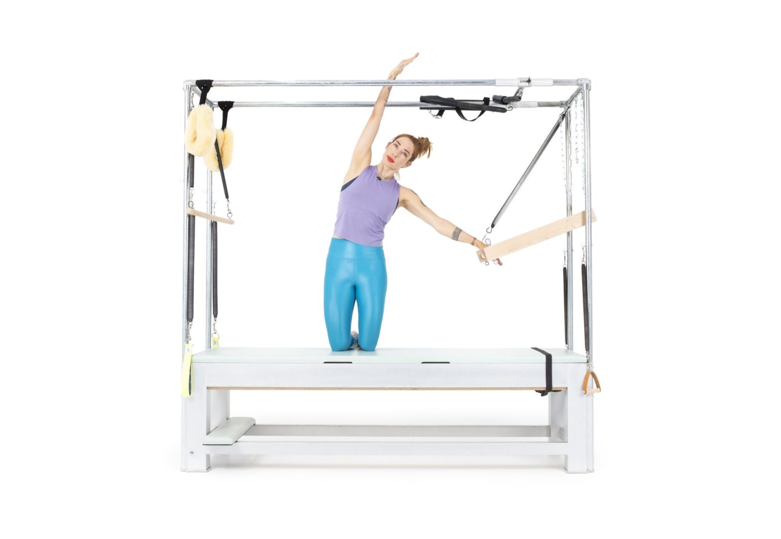 Kneeling-Side-Bend-with-Push-Thru-Bar-on-the-Cadillac-or-Tower-Online-Pilates-Classes-1