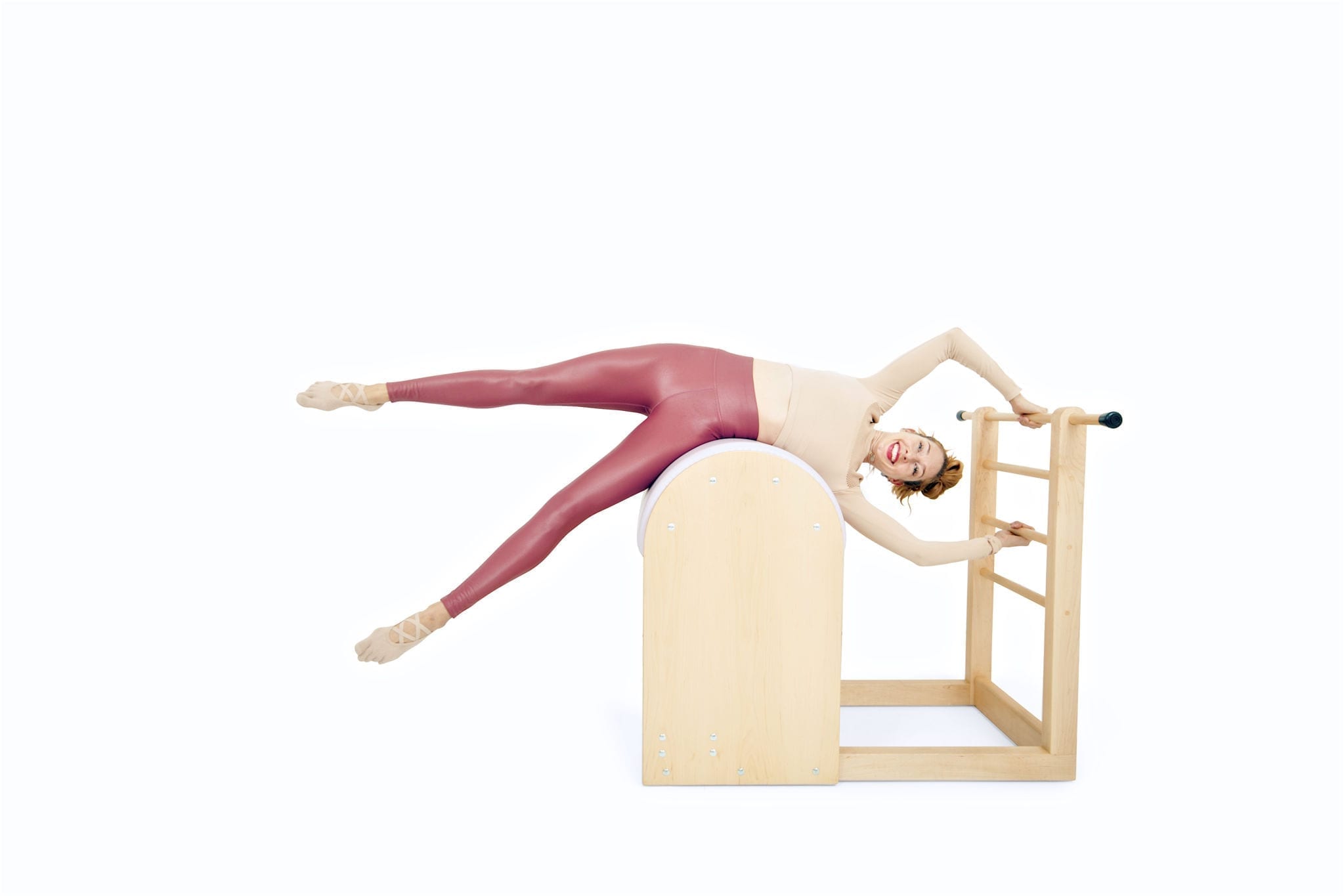 Side-Stretch-Ladder-Barrel-Lesley-Logan-Online-Pilates-Classes