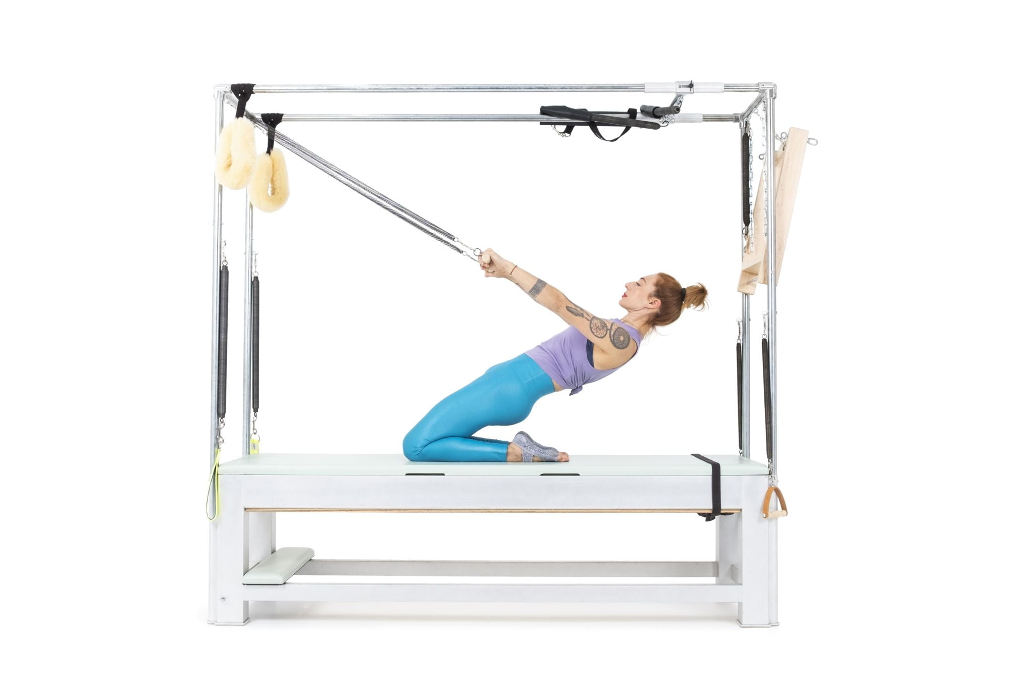 Thigh-Stretch-with-Roll-Back-Bar-on-the-Cadillac-or-Tower-Online-Pilates-Classes-scaled